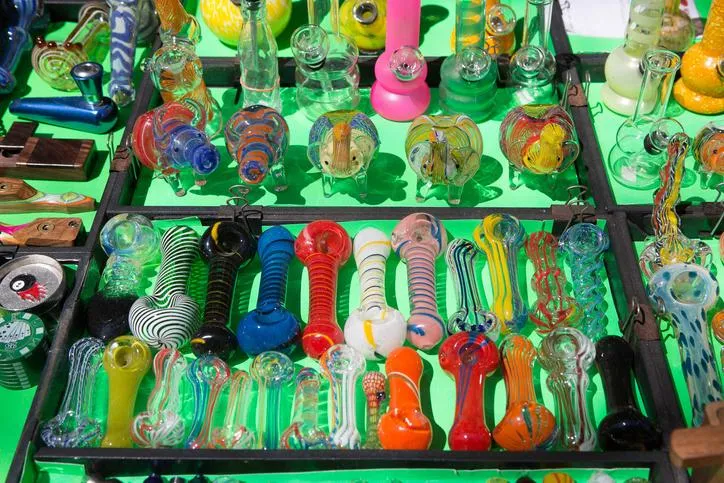 Selection of bongs and pipes from various brands at our smoke shop in Seminole, FL, featuring unique designs and styles.