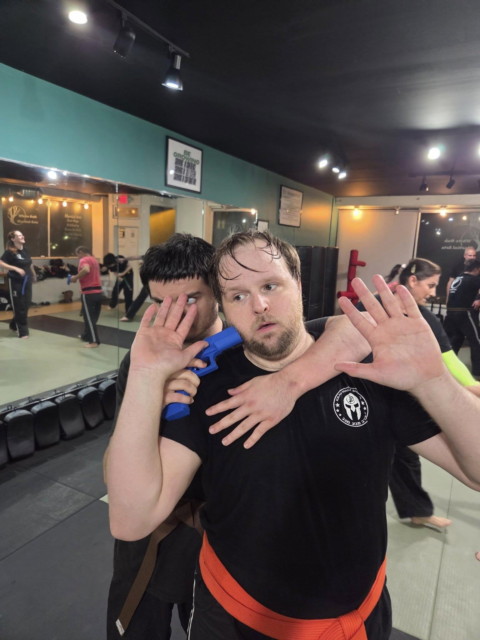 Krav Maga students training together