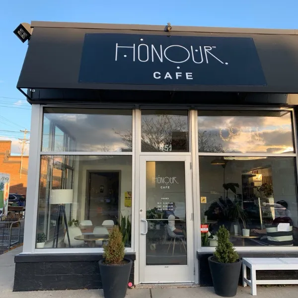 Crystal clear storefront windows at Honour Cafe cleaned by WellDone Windows commercial service