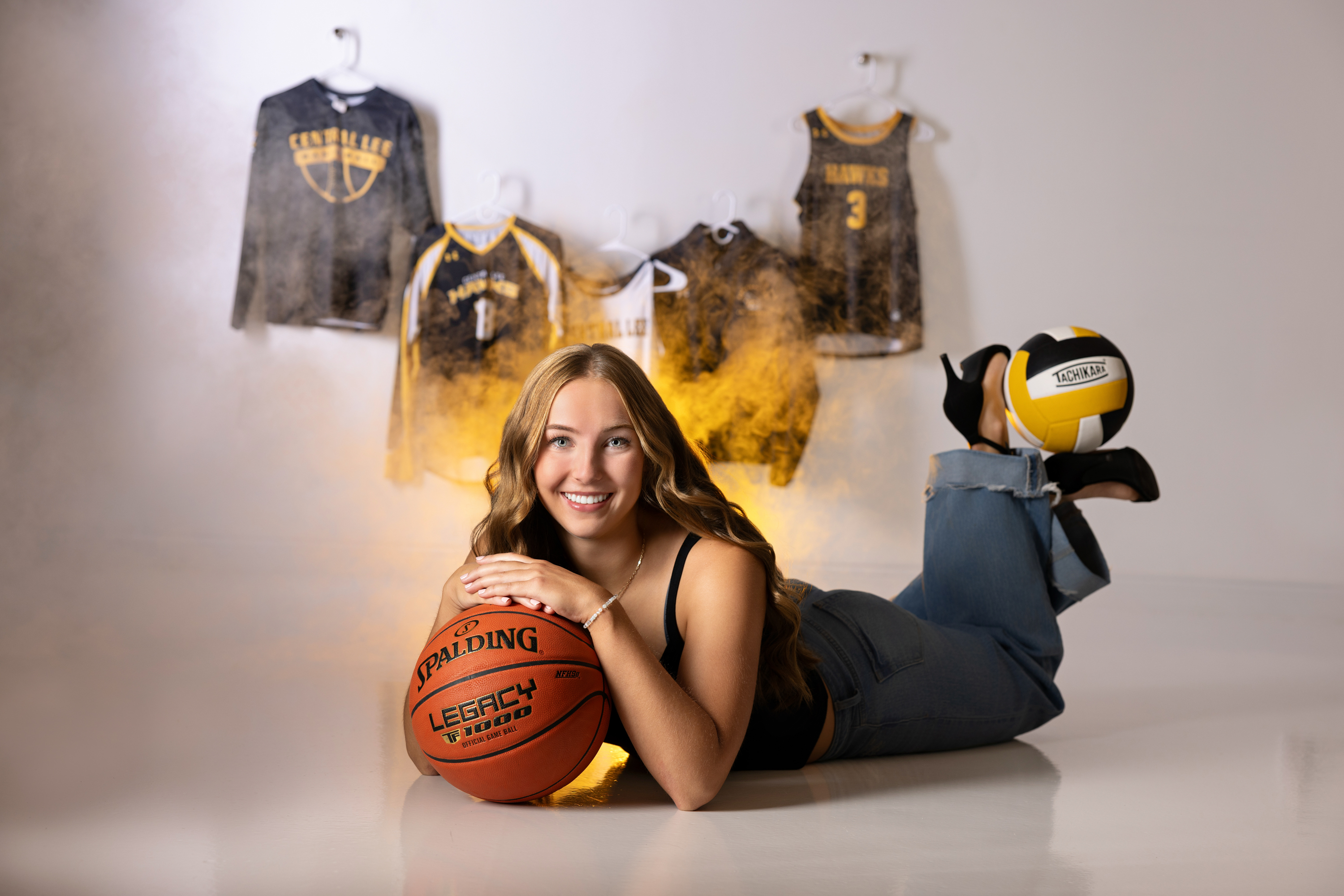Senior guy leaning on railing in urban portrait setting