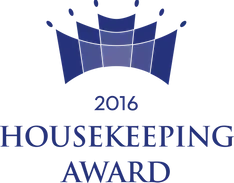 Green enamel visitor award badge with laurel motif, photorealistic, for masthead