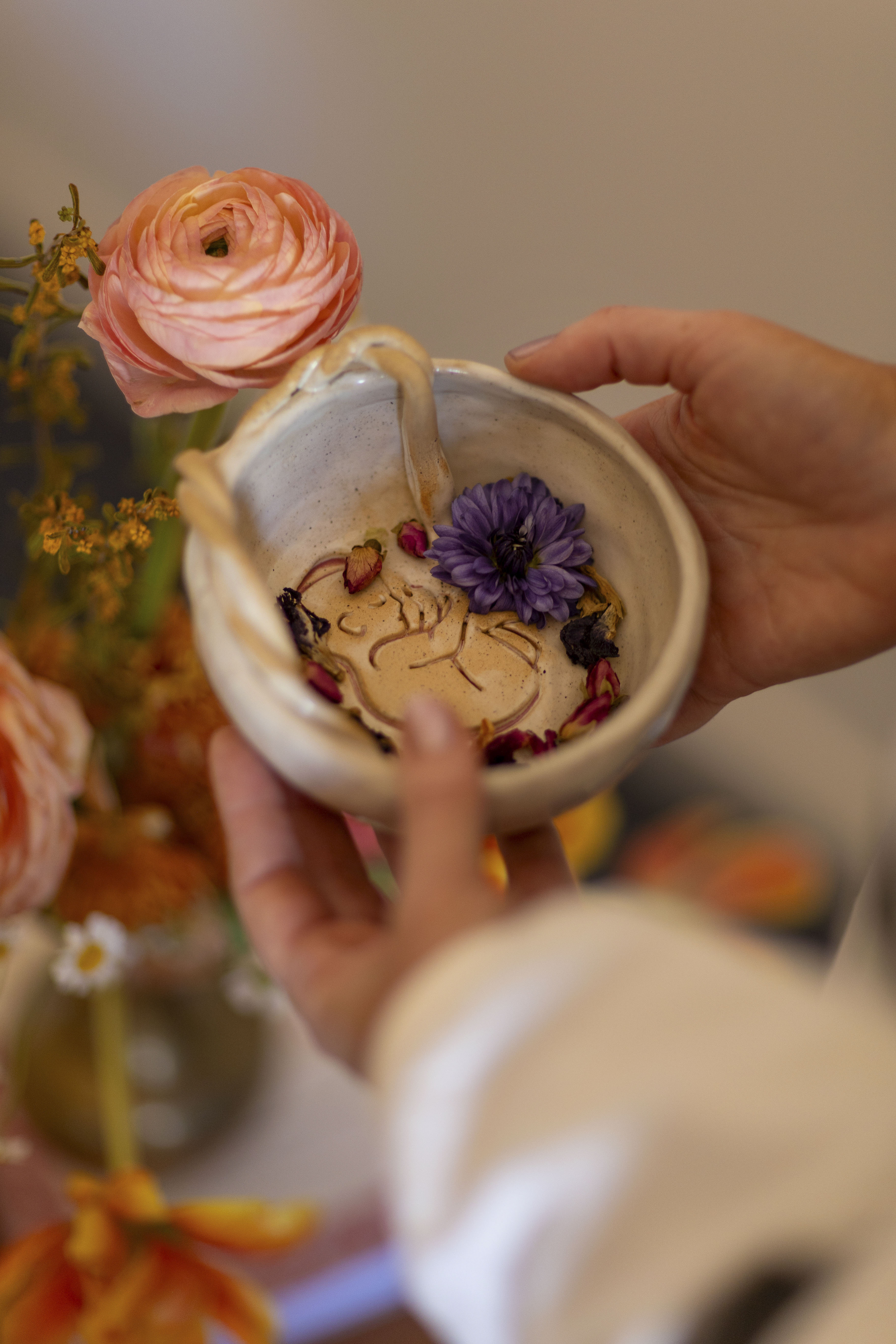 Warm studio sanctuary circle with round cushions in soft morning light.