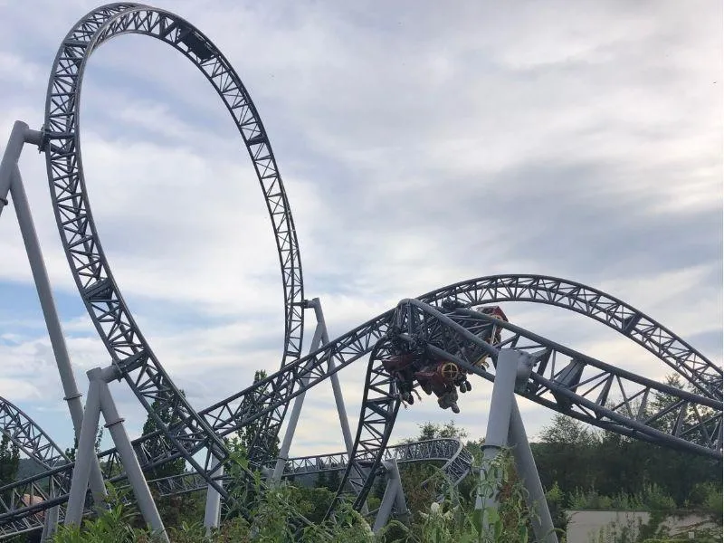 Kids upside down on a rollercoaster at Europa-Park in Germany, having fun during a high-energy European vacation adventure