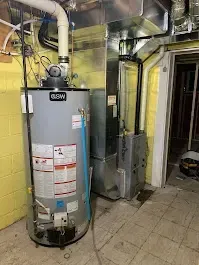 an upgraded furnace systems and water tank that was installed for a residential client