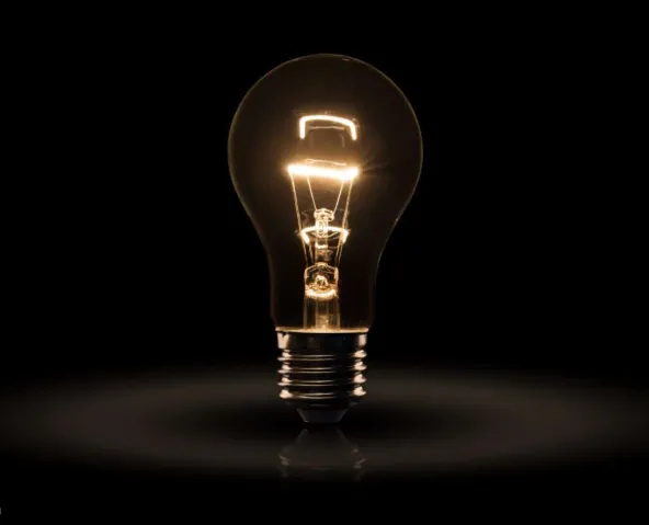 human hand holding plasma ball