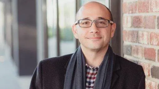 a group of women standing next to each other