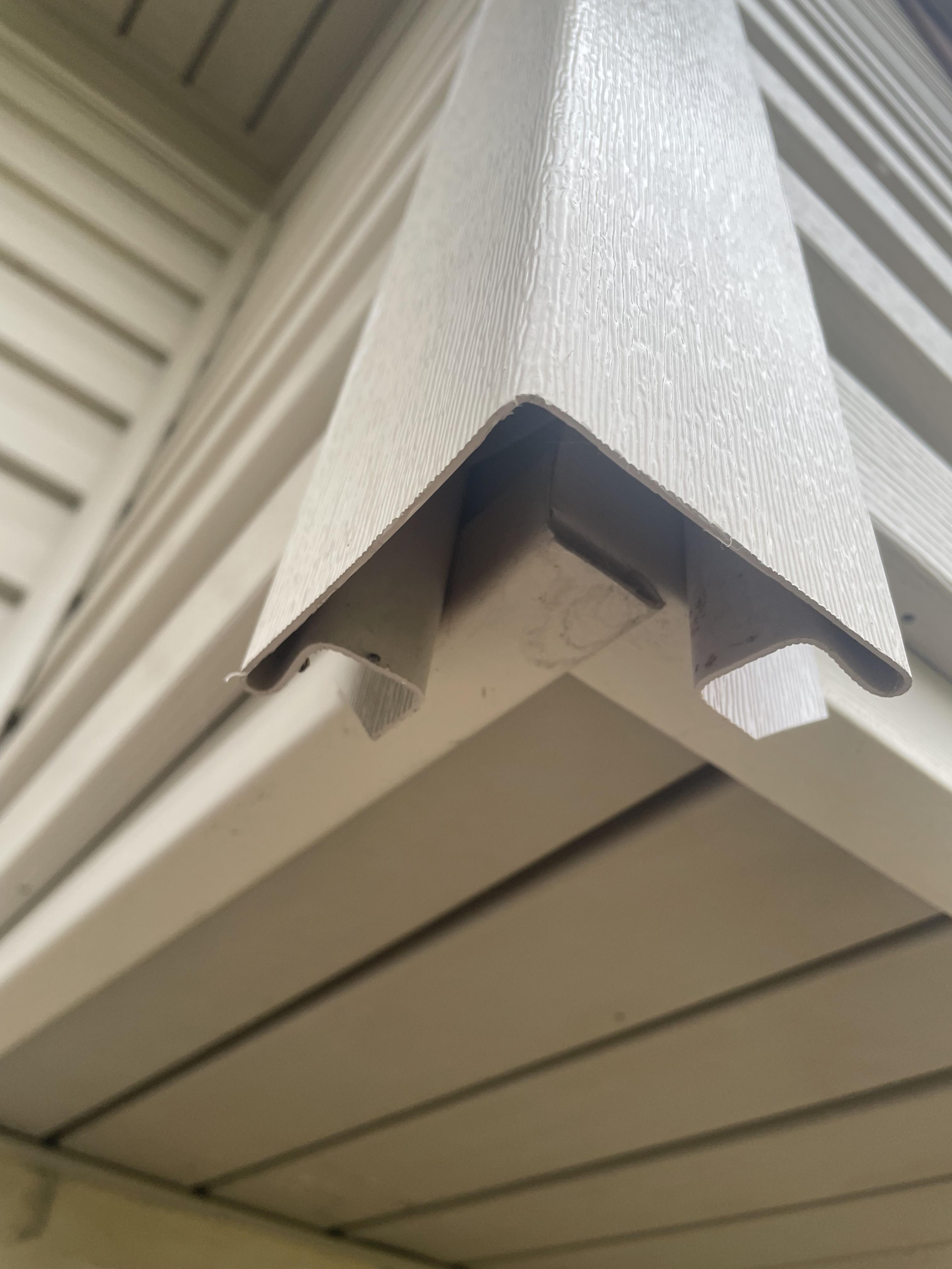 black and white cocnrete building low-angle photography