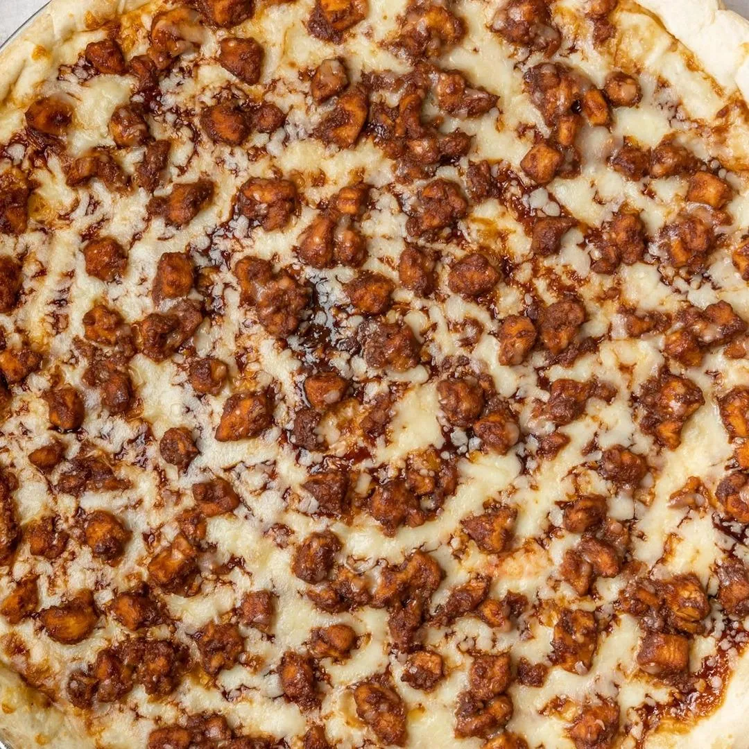 Barbeque-Chicken Pizza with barbeque-style chicken toppings.