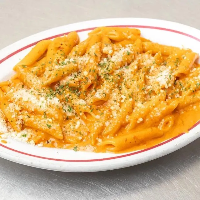 Tomato Sauce Pasta served with a rich tomato sauce.