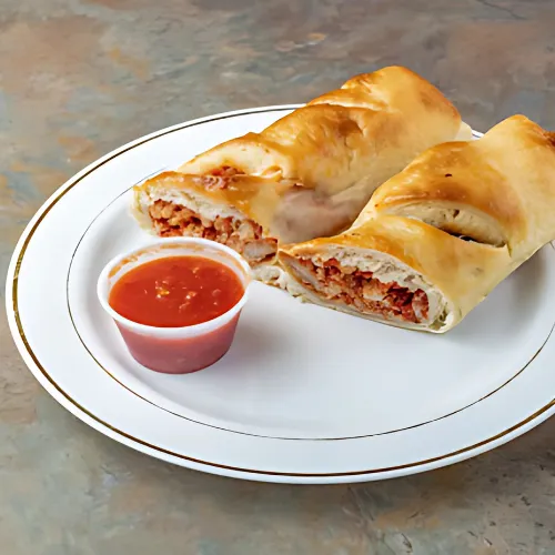 Buffalo Chicken Roll: A delicious roll filled with spicy buffalo chicken, melted cheese, and tangy sauce, wrapped in soft dough and baked to golden perfection.