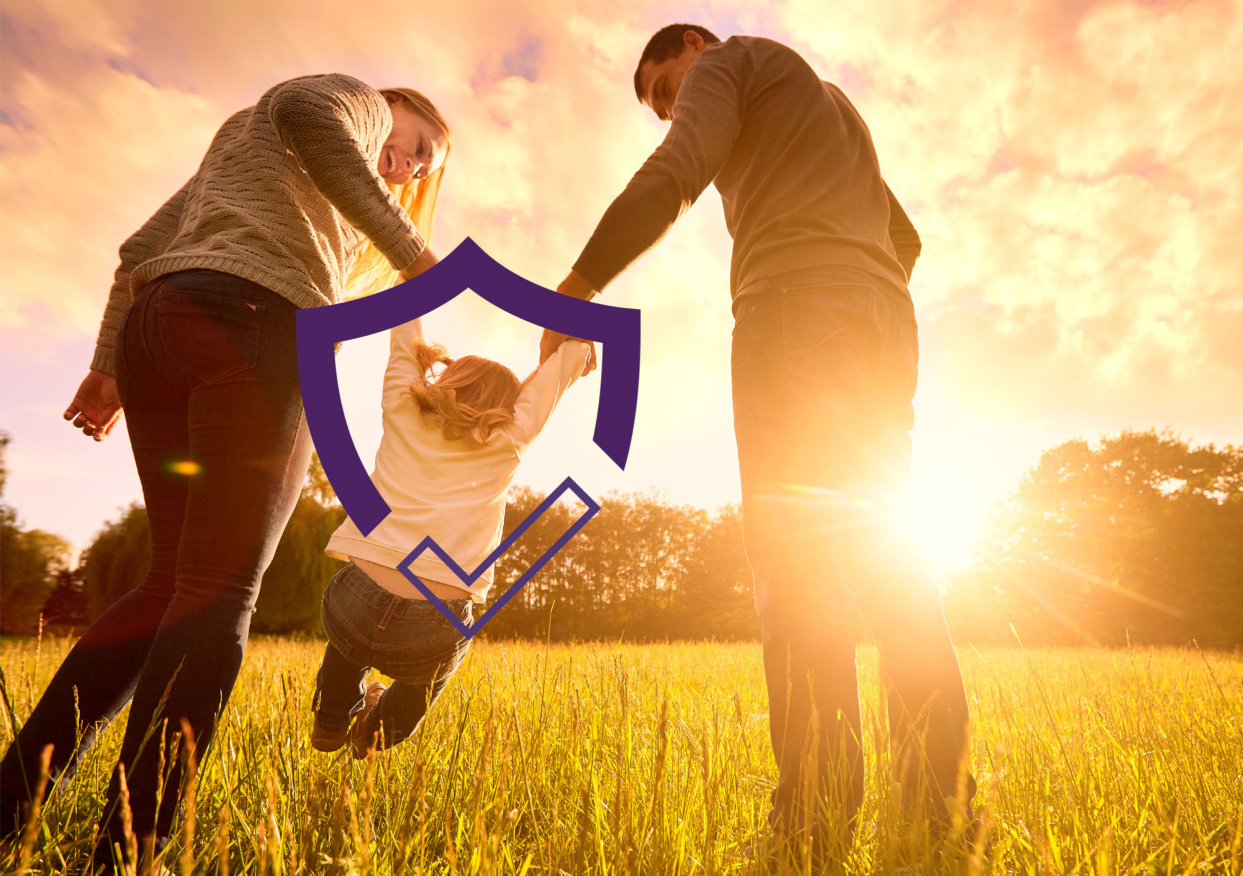 Family with two parents swinging their child in a sunny field, representing family protection insurance