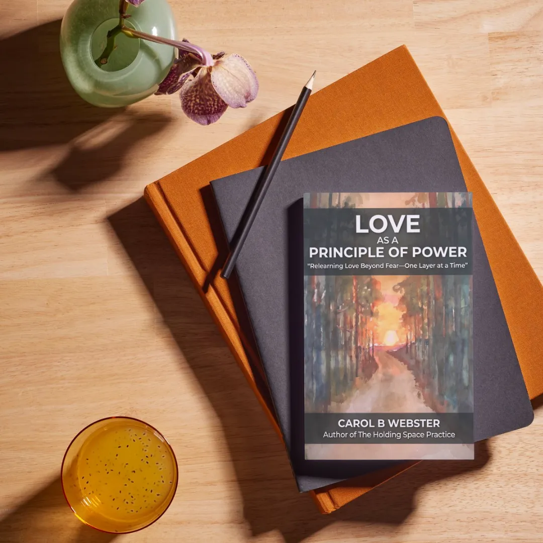 Love as a Principle of Power book on a desk