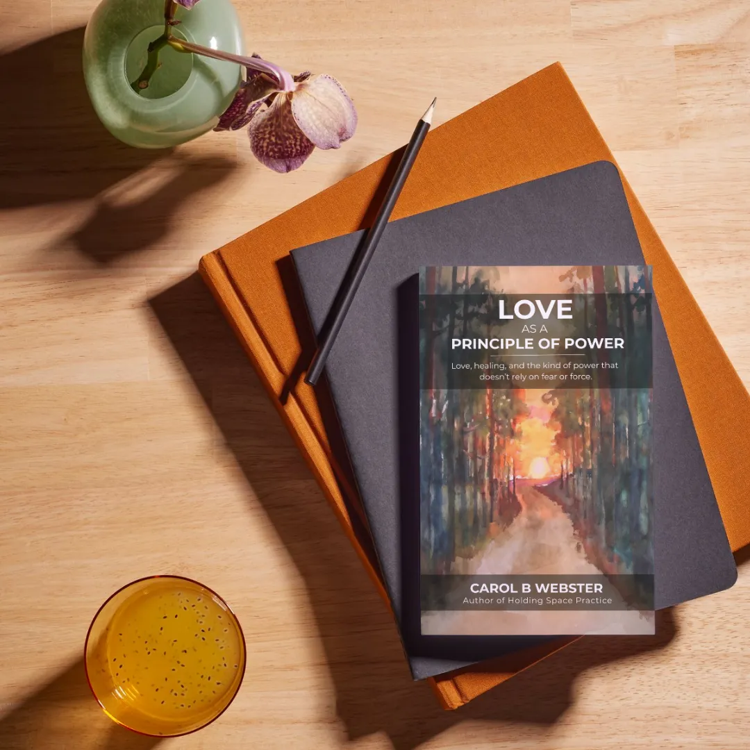 Love as a Principle of Power book on a desk