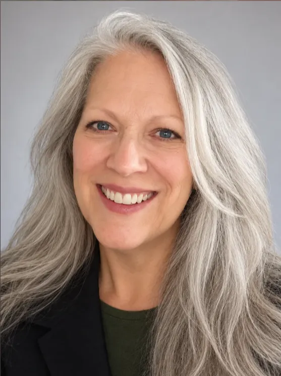 Portrait of the author in warm, desaturated tones