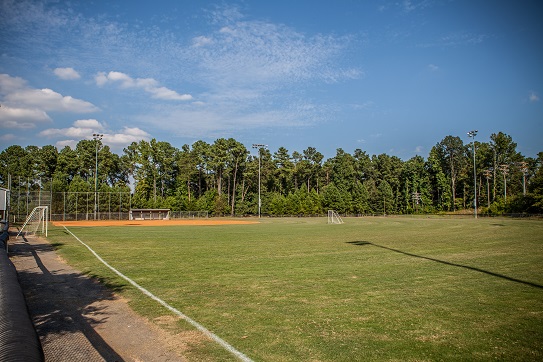 Turner Field sports complex in Tega Cay featuring baseball and softball fields, sports courts, and open green space near The Palisades.