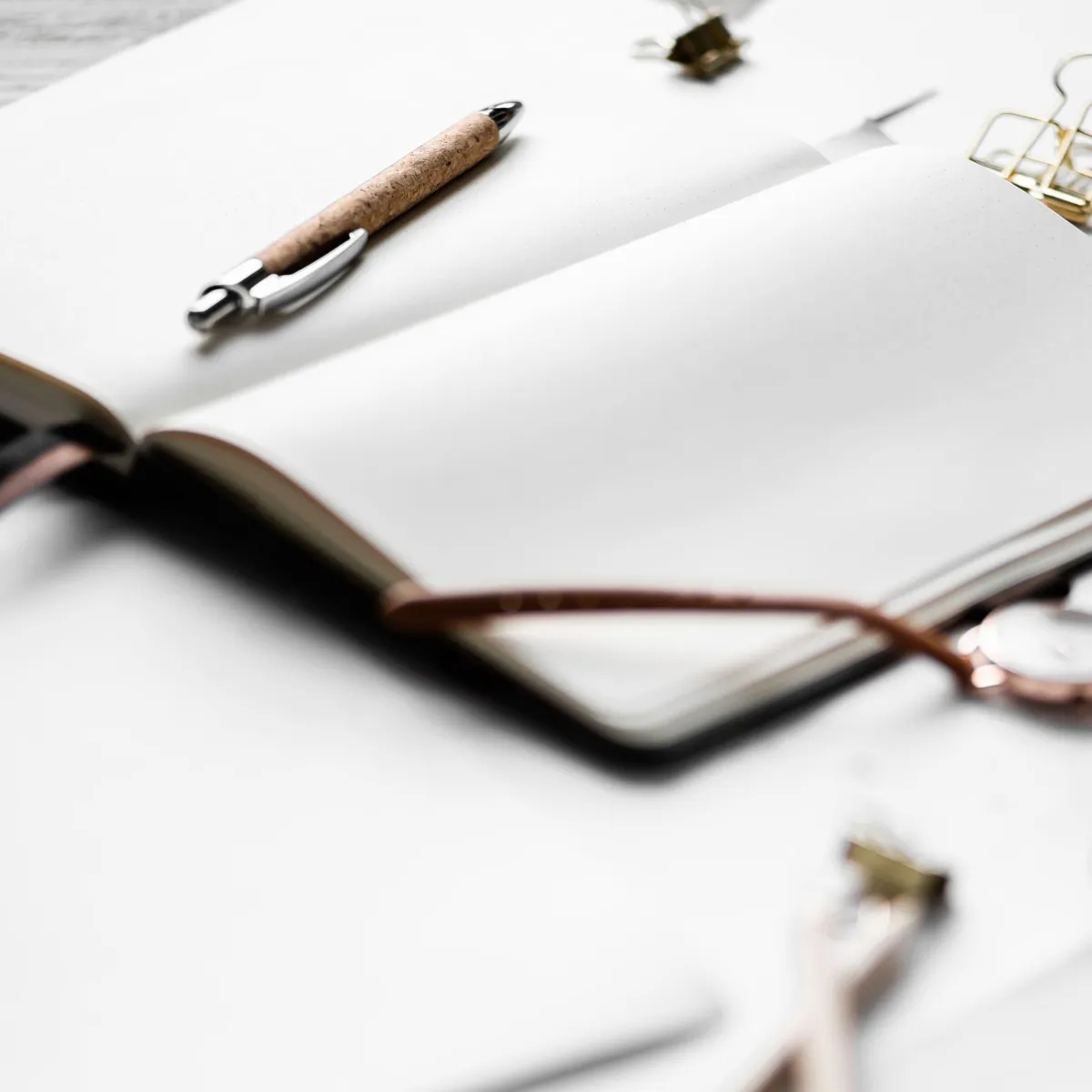 Watch pen open journal blurred