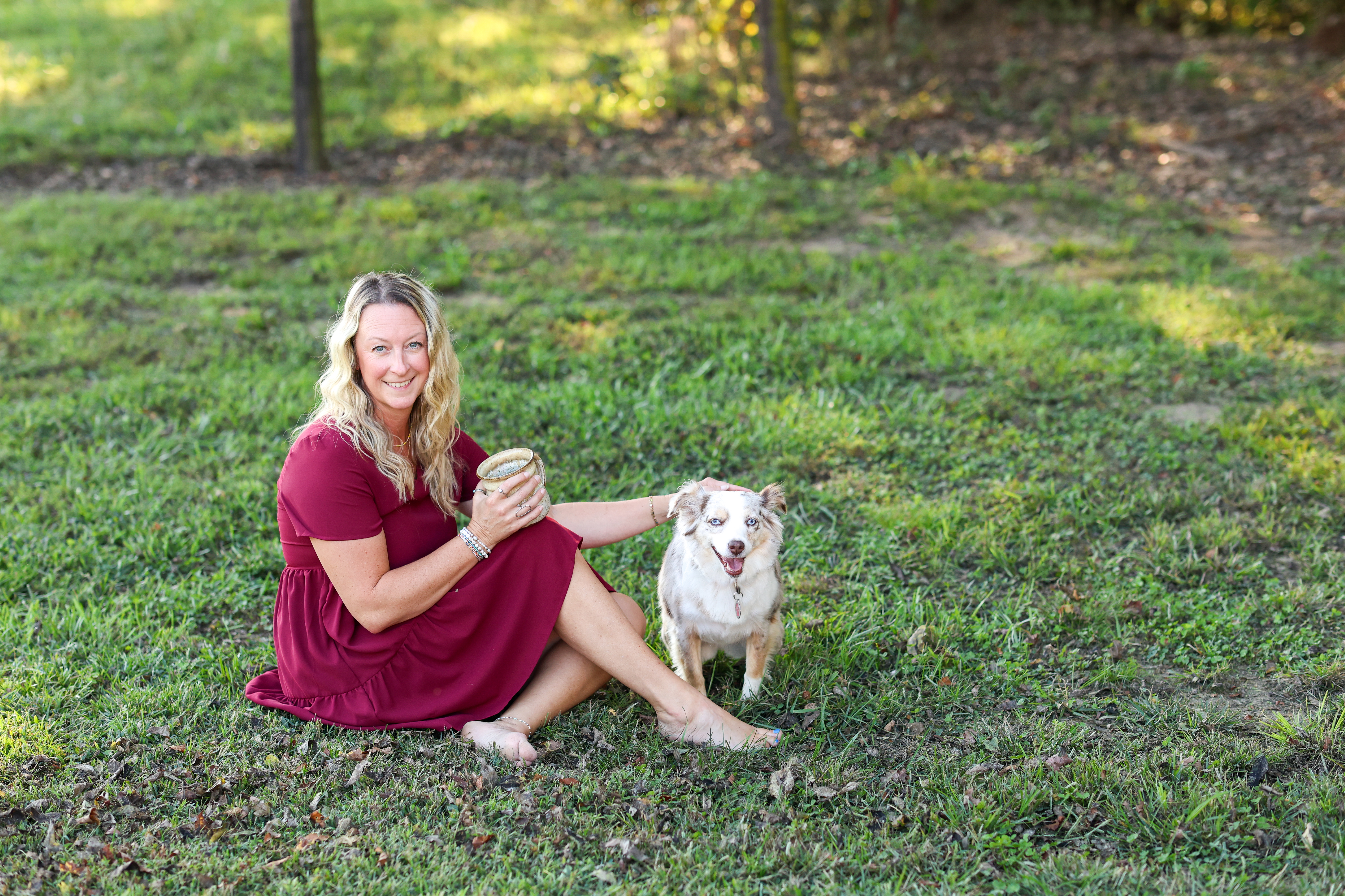 Alicia Trotter with Her Dog in The Garden