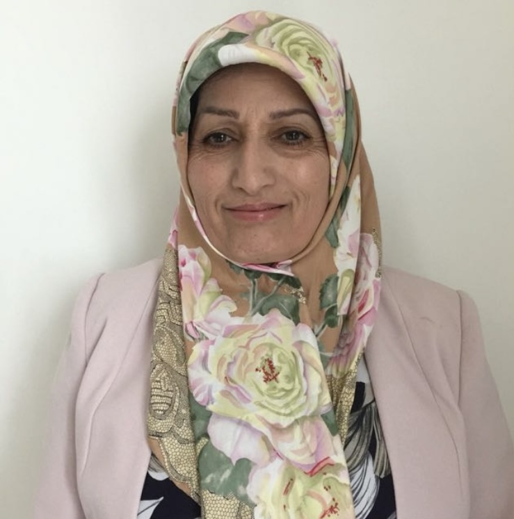Environmental portrait of the practitioner in a calm clinic setting