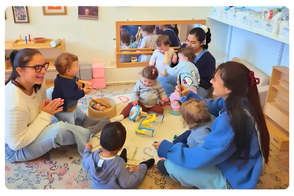 Children learning letters and phonics during circle time at The Nurtury Montessori classroom