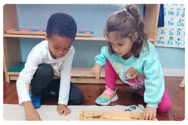Children learning in montessori classroom