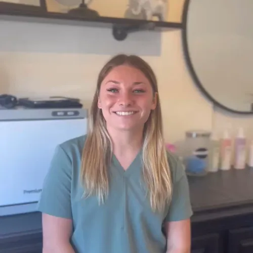 rofessional headshot of Audrey, a certified sugaring specialist at Sugarmama's Beauty Collab.