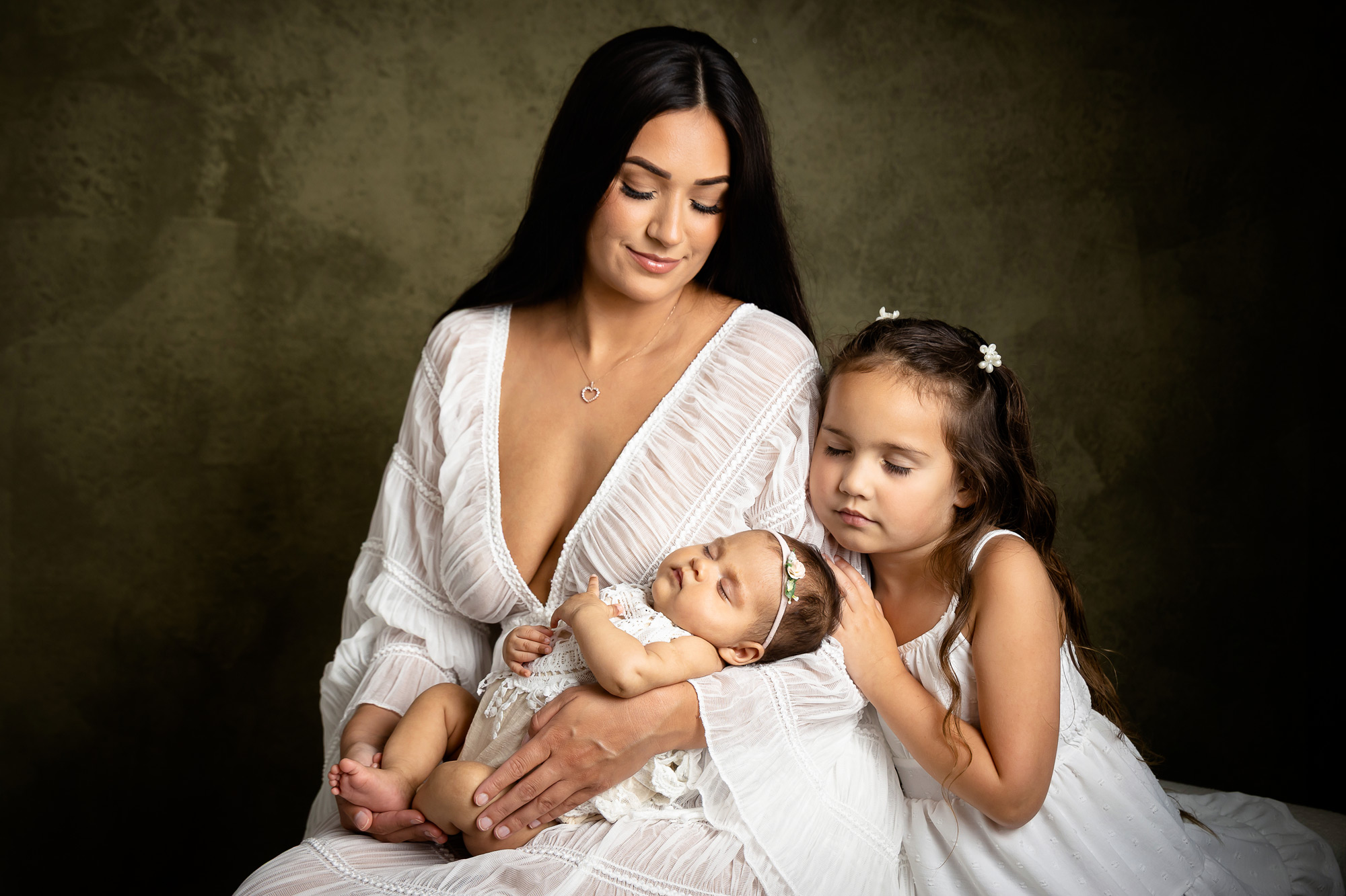 A couple holding hands and walking along a beach at sunset, their silhouettes softly illuminated by golden light. The scene is tranquil, with gentle waves and pastel skies, evoking intimacy and timeless romance.