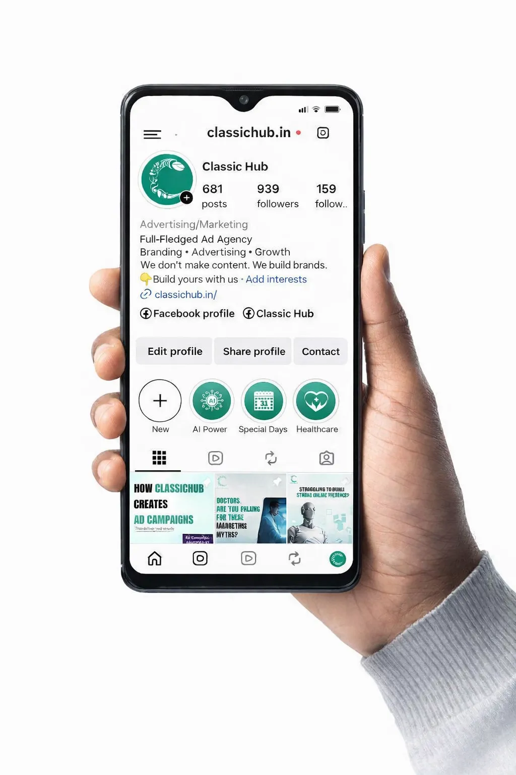 Hand holding phone displaying social media app