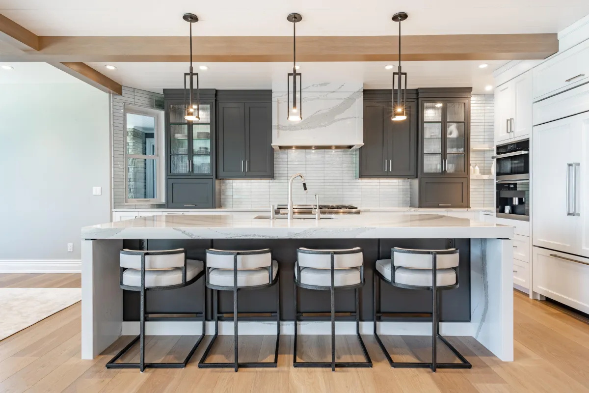 A large kitchen with a center island and a chandelier