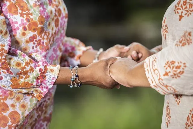 friends holding hands