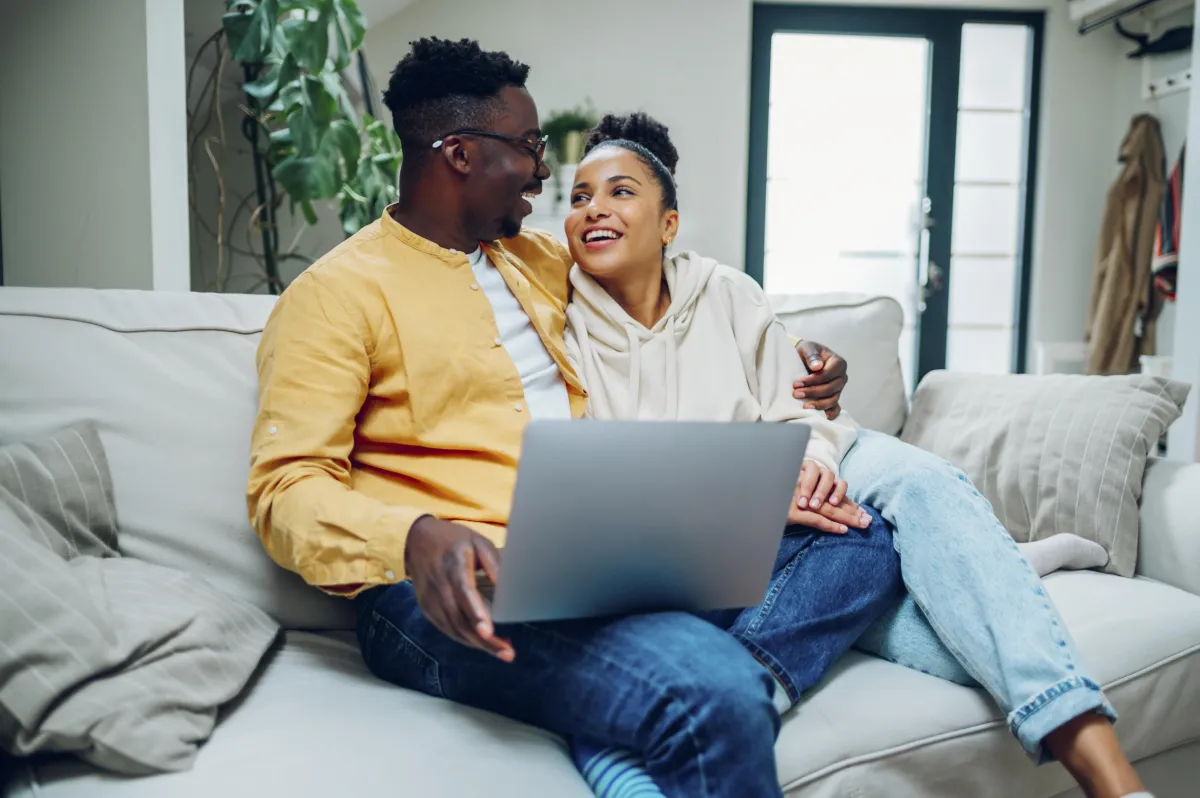 a close up of a purple flower with a green center