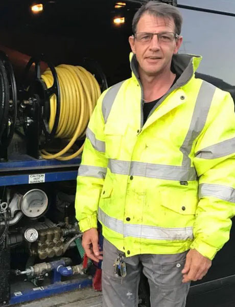 Plumber with customer in the bathroom