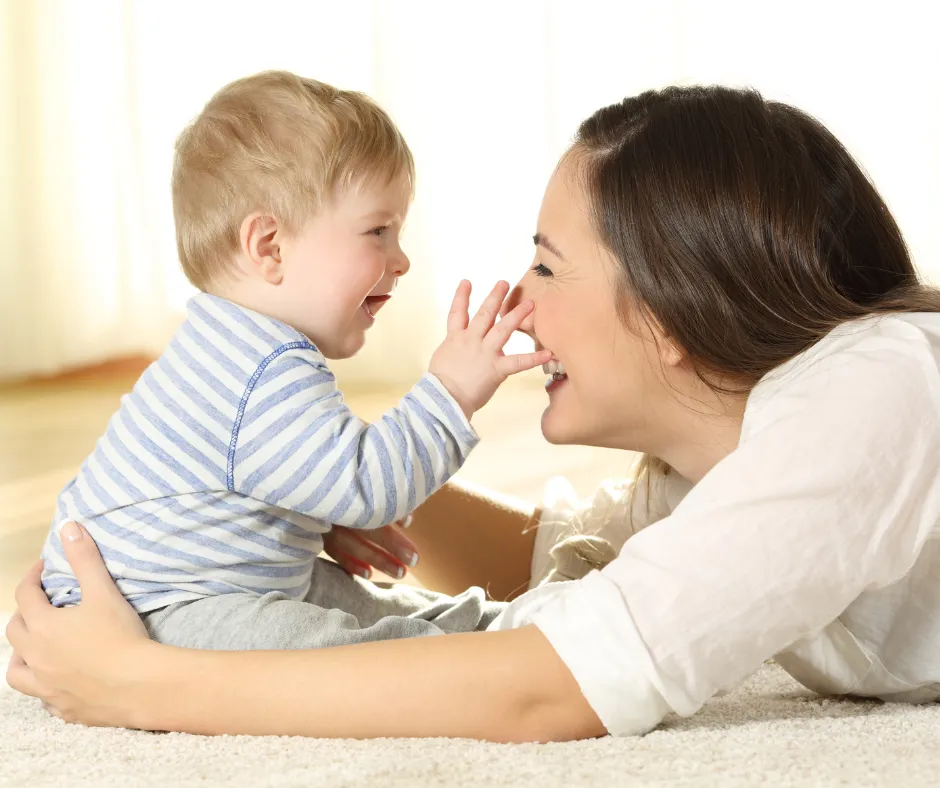 Parent holding baby during sleep time, Infant Sleep Course by The Sleepy Little Bubs