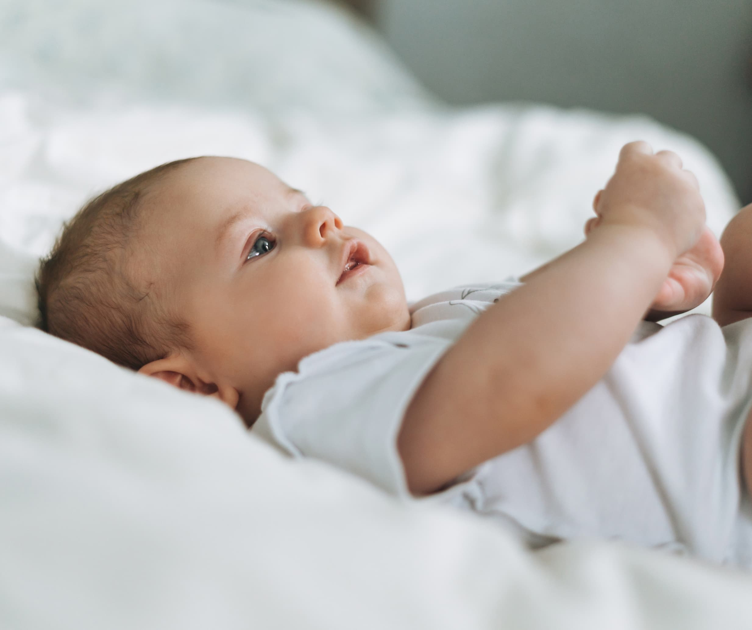 Newborn baby awake during newborn sleep support