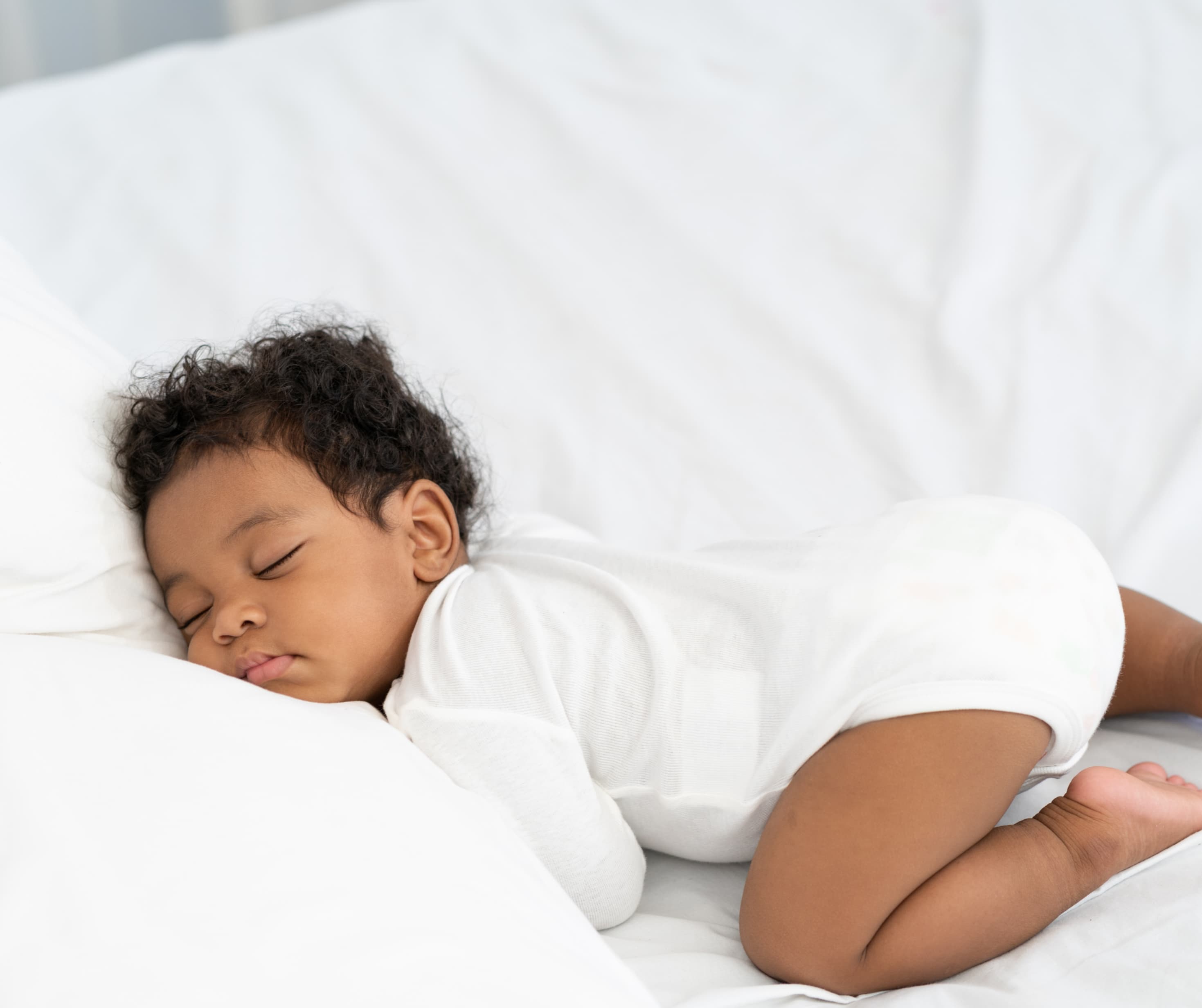 Toddler sleeping during baby and toddler nap transition support