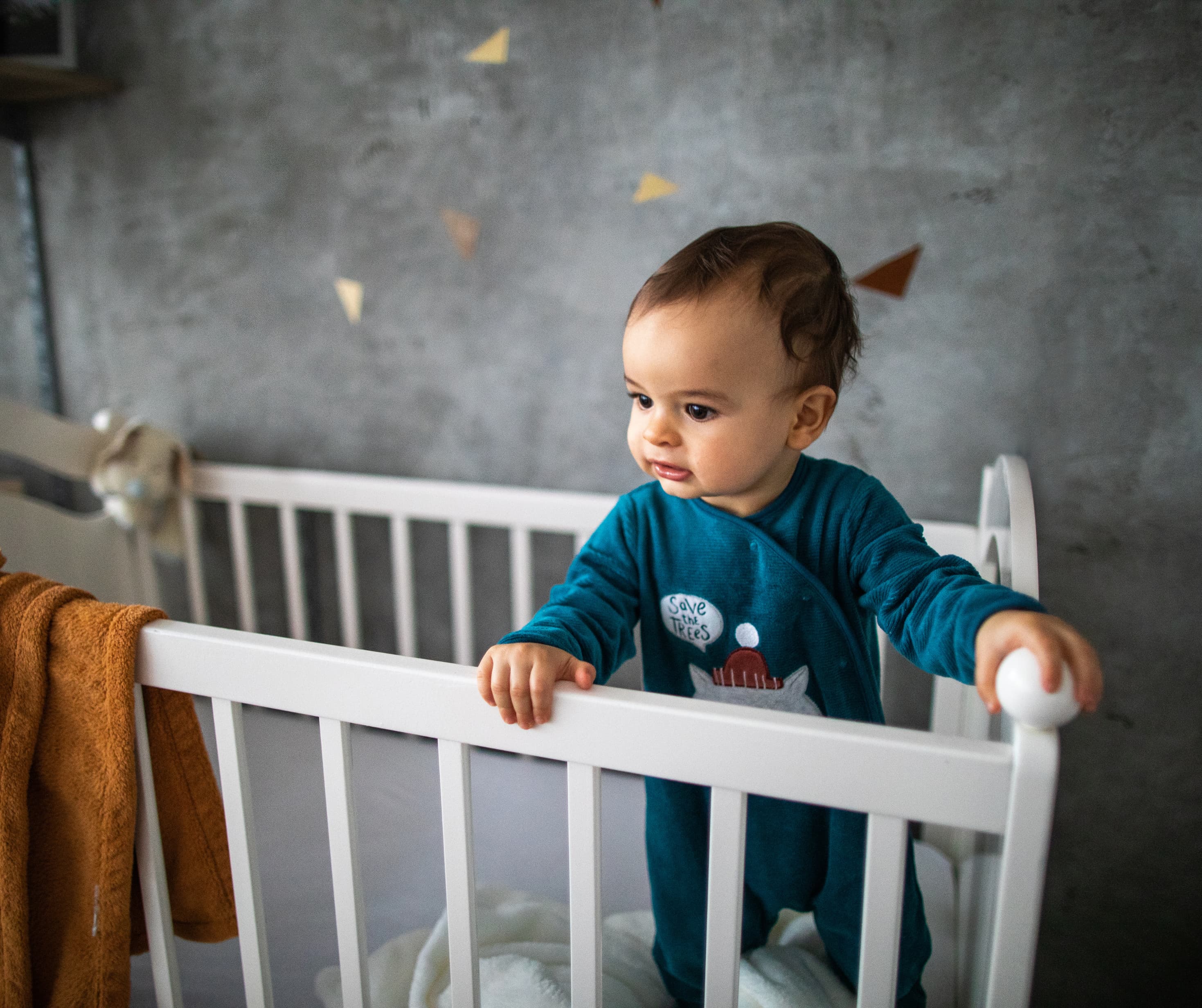 Baby standing in cot during frequent night waking support