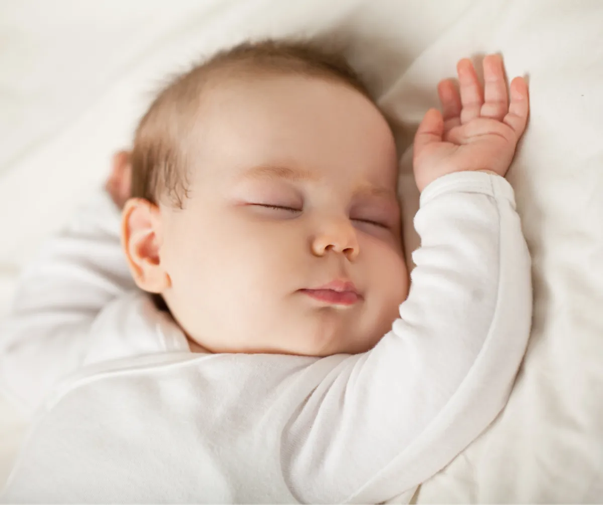 Sleeping baby featured in an infant sleep training program for babies aged 5 to 24 months
