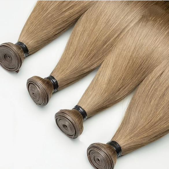 Woman in pink lingerie lying on white background