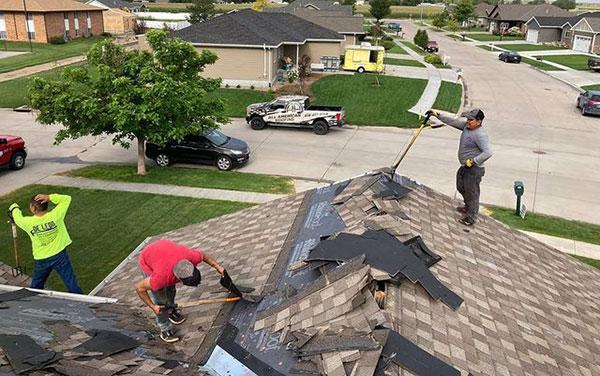 expert roofers working on the roof