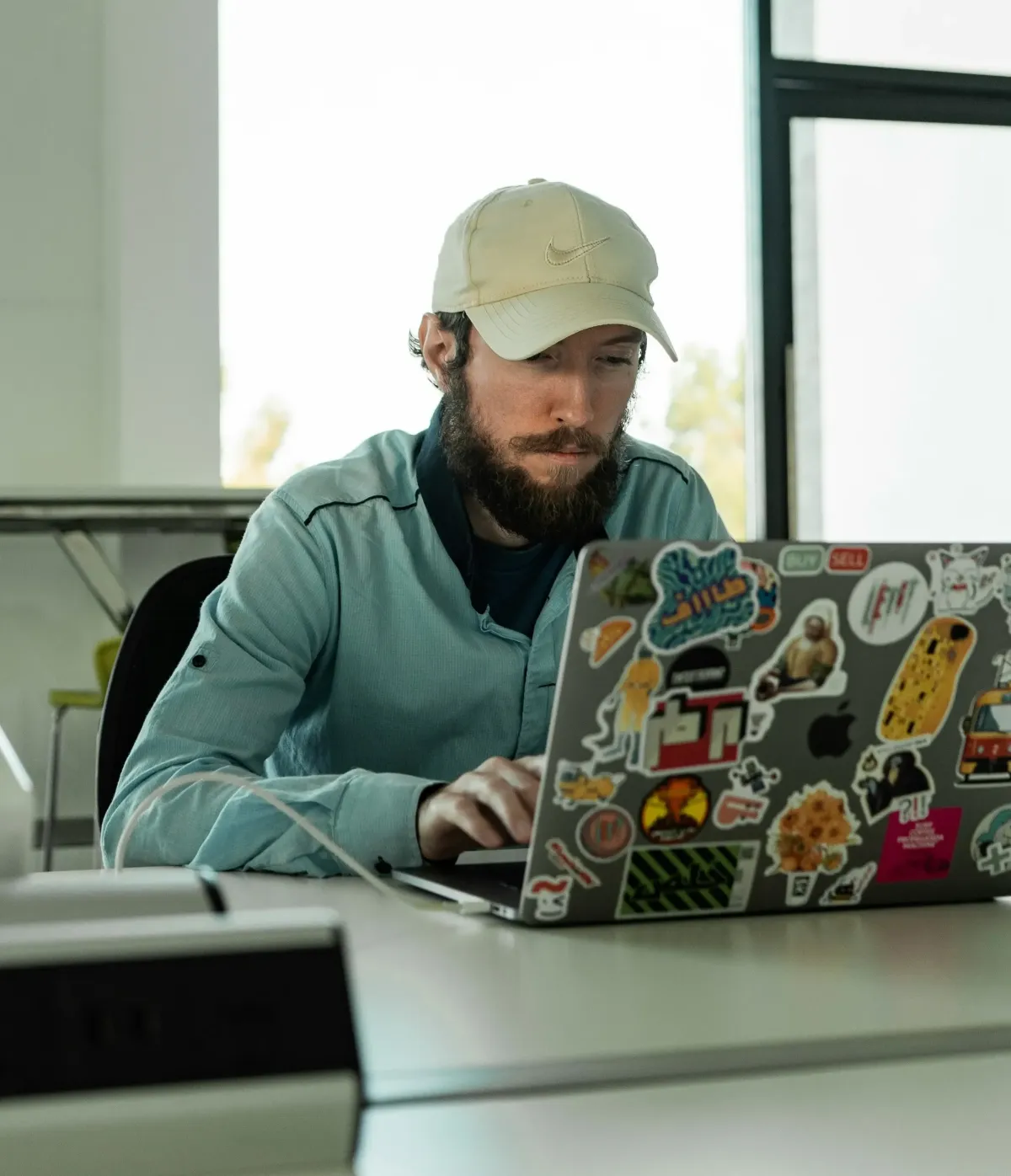 Marketing specialist conducting a free business audit on laptop