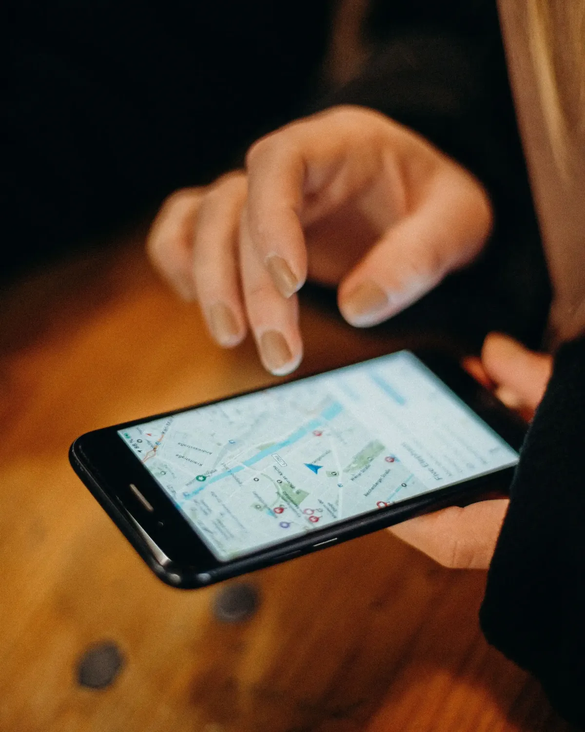 Person checking Google Maps directions on smartphone