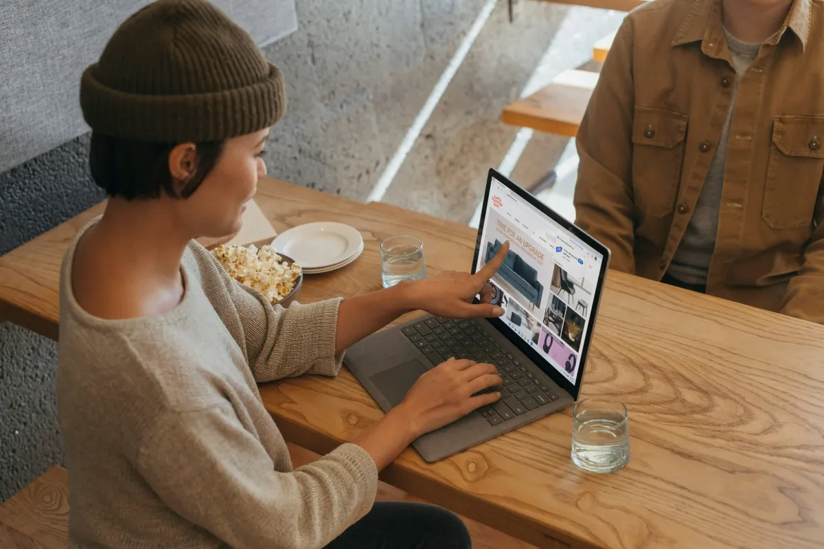 Business owner discussing automation options on laptopBusiness owner discussing automation options on laptop