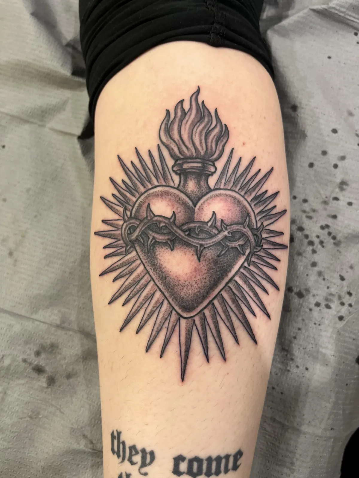 person with tattoo on right arm