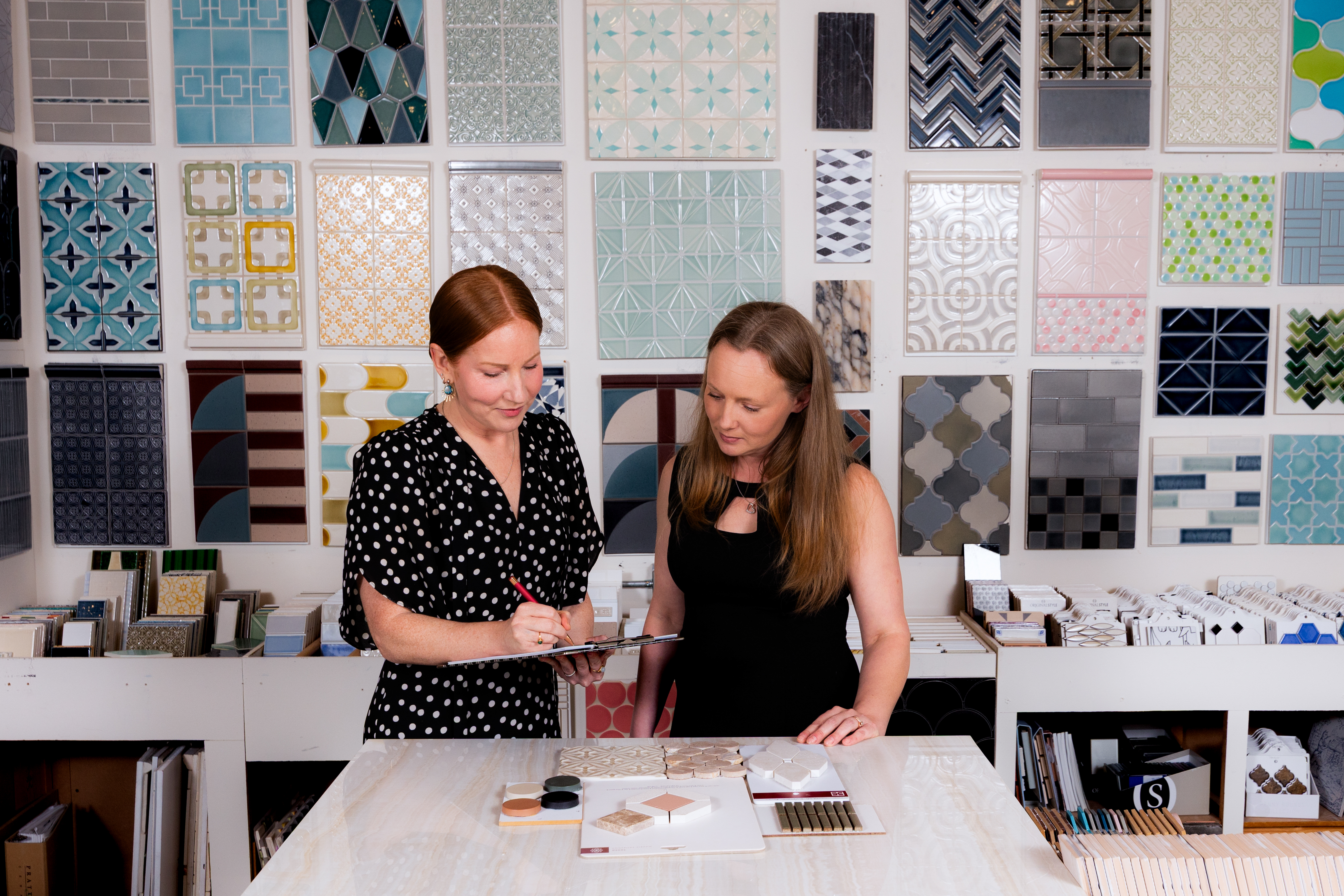 Tile Market staff assisting with tile selections