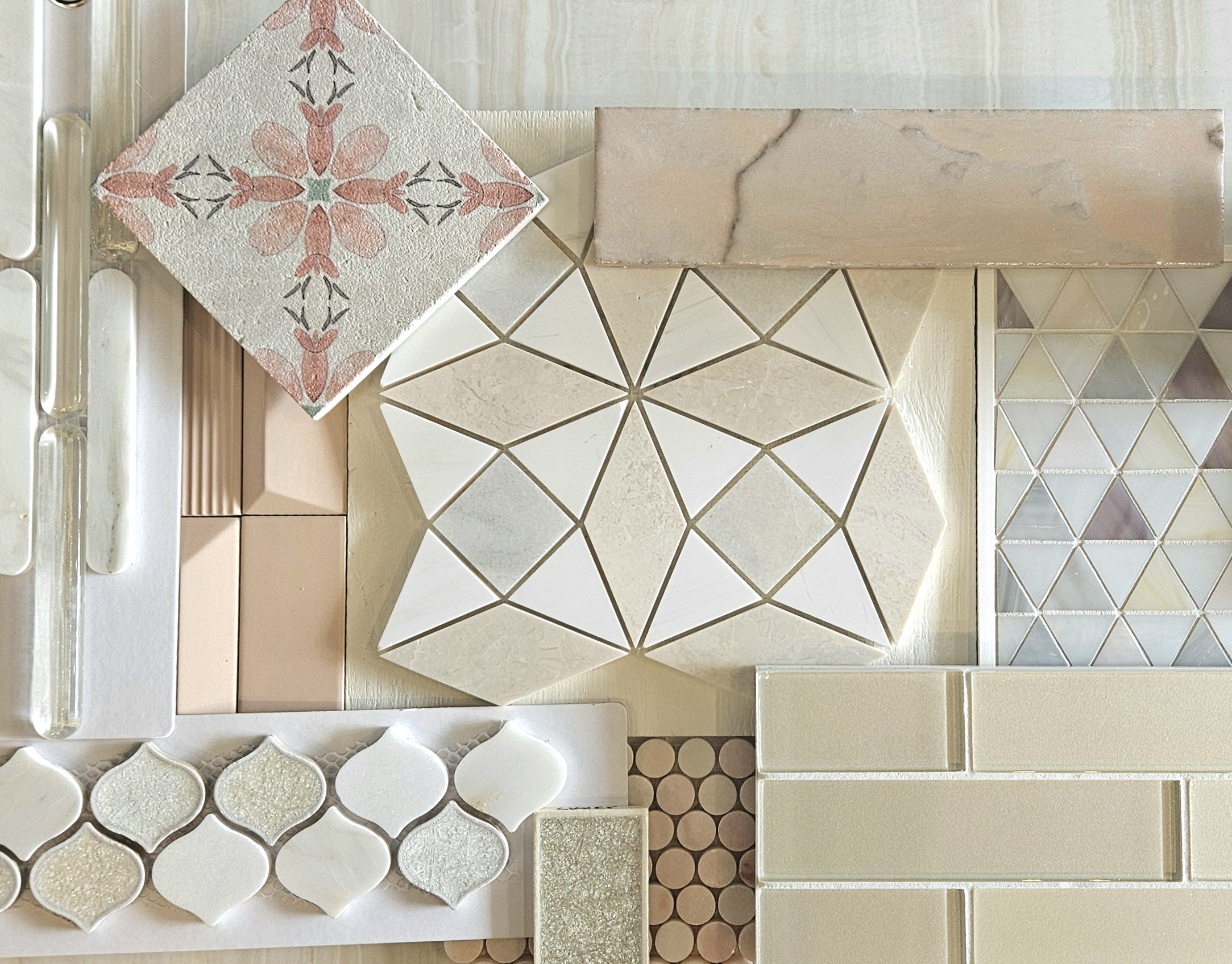 A mix of materials including glass mosaics and field tile.