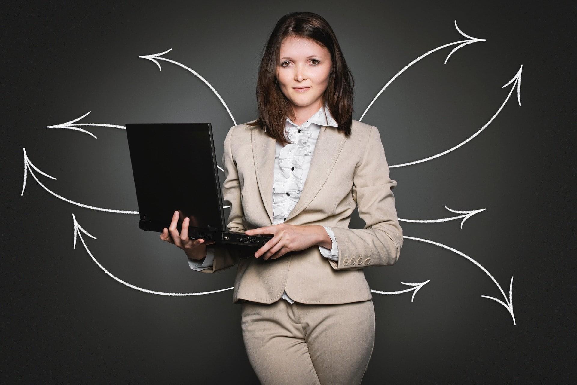 Photo of a business woman with arrows going in multiple directions to indicate that Ask The Resume Lady's career coaching can help engineers develop their career path