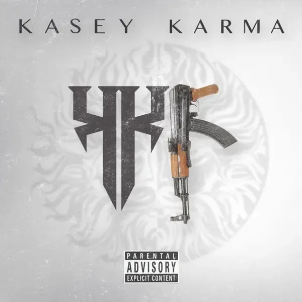 Kasey Karma performing live with neon lights and crowd