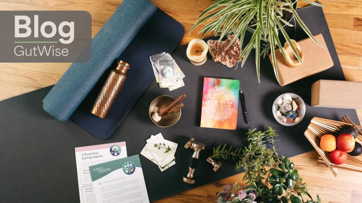 Stylized flat lay of health and wellness items symbolizing gut health, mindful living, and holistic practices
