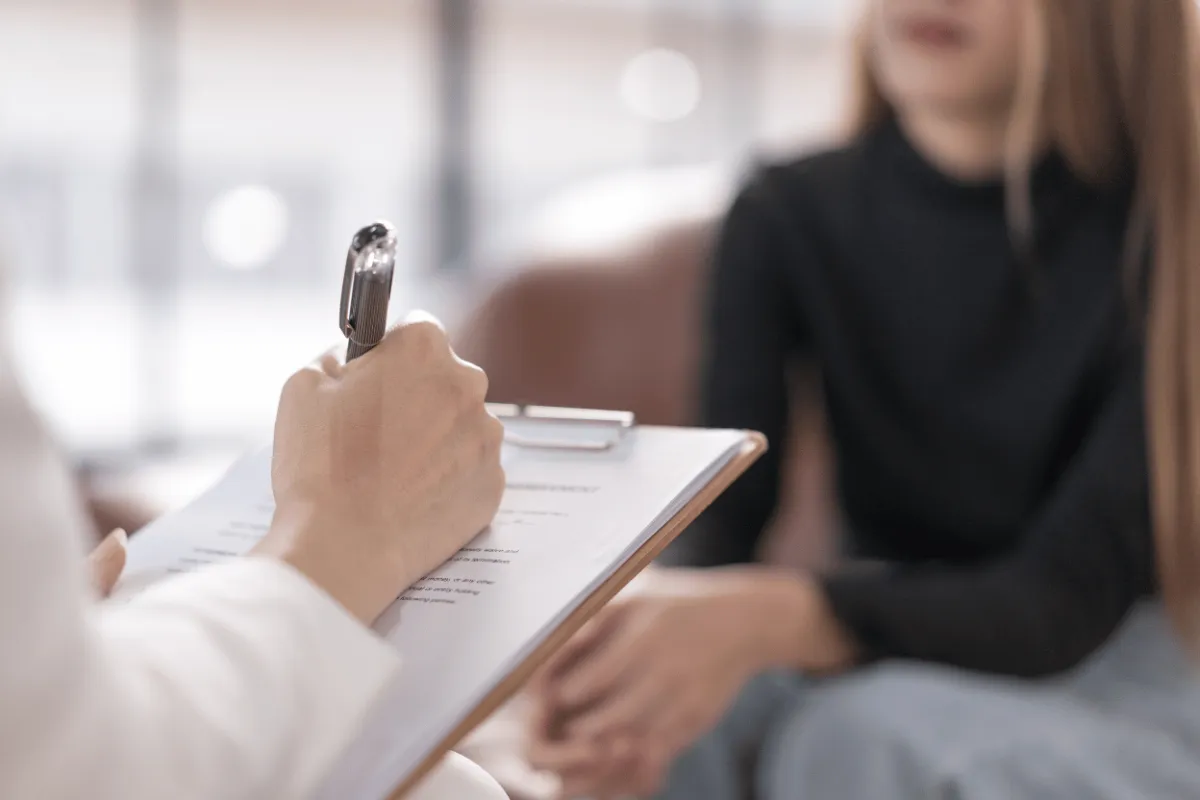 alt="a clinical counseling session"