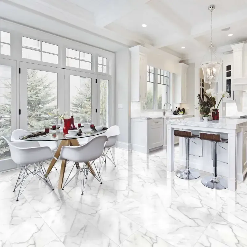 Polished marble-effect stone floor restored by Cornwall Floorcare in a modern kitchen