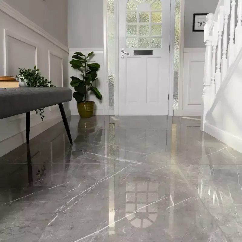 Highly polished marble-effect stone floor restored by Cornwall Floorcare